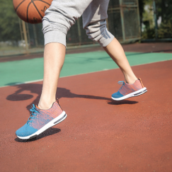 Person playing basketball