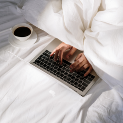 Person typing on laptop